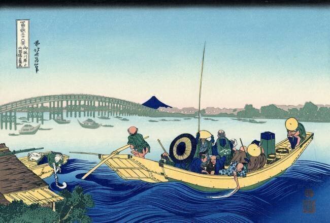 Coucher de soleil sur le pont Ryogoku depuis la rive de la rivière Sumida à Onmagayashi à Edo. Hokusai