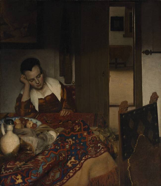 Girl asleep at a table Johannes Vermeer
