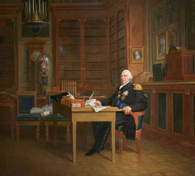 Le roi Louis XVIII méditant sur la Charte, assis à sa table de travail au palais des Tuileries Michel Marigny