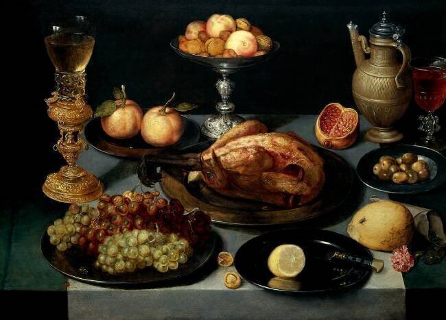 Mets, fruits et verre sur une table Peter Binoit