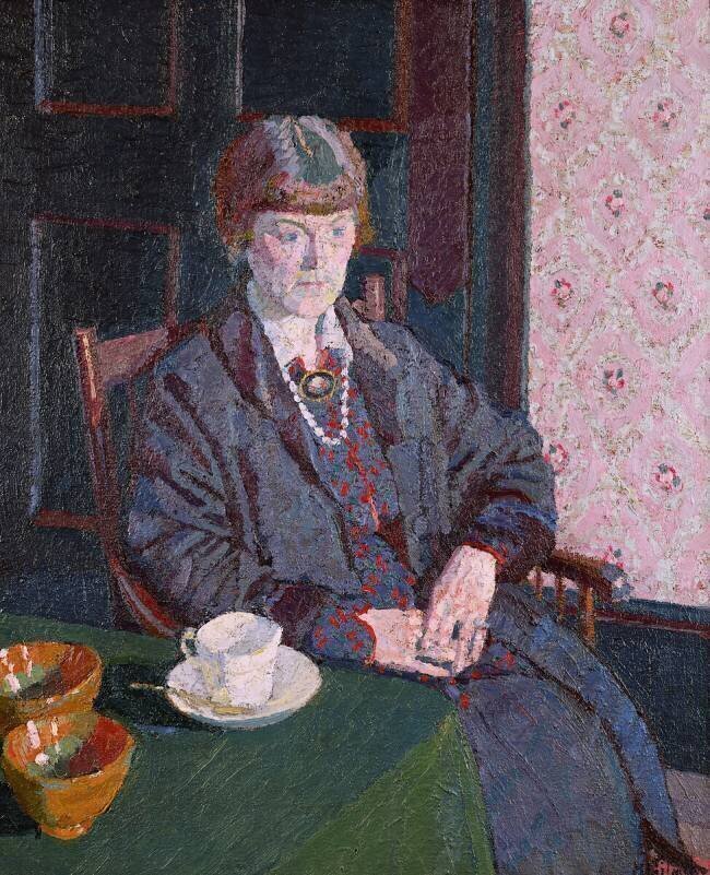 Woman Sitting at a Table Harold Gilman