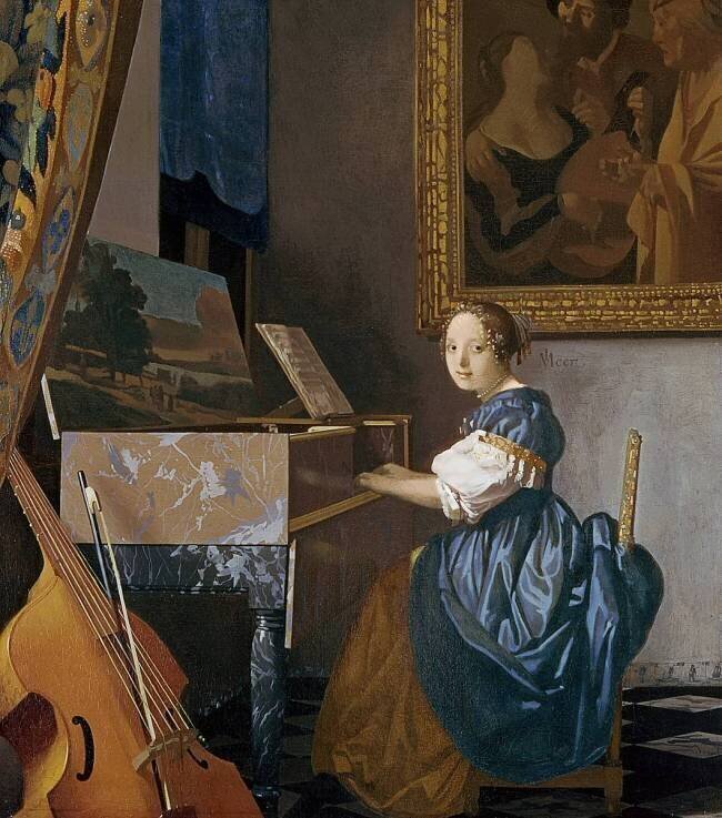 Jeune fille assise devant un virginal Johannes Vermeer