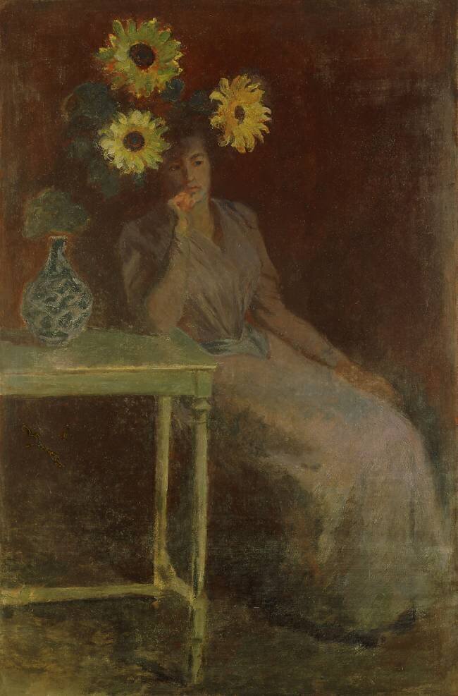 Suzanne avec des tournesols Claude Monet