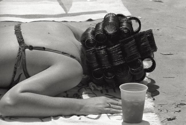 A woman in the sun in Cape Kennedy bay Mario de Biasi