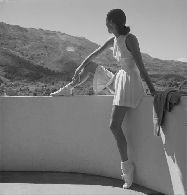 Fashion model wearing tennis outfit Toni Frissell