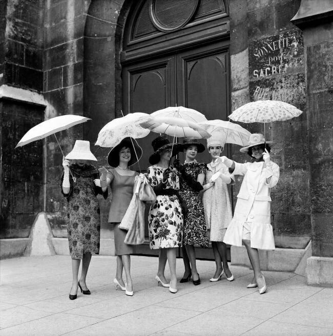 Outdoor fashion show with umbrellas Keystone