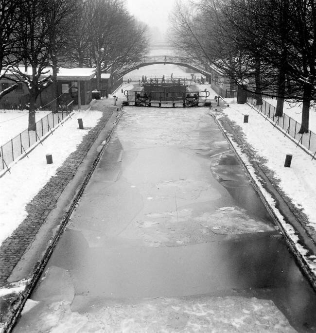 View of Canal Saint Martin in Paris Frozen during Winter  Rue des Archives