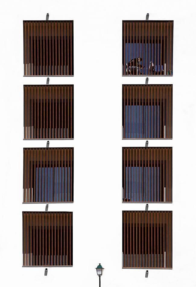 Between bars Elena Arjona