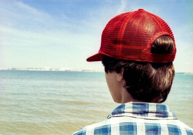 Casquette rouge. Jerome Siran