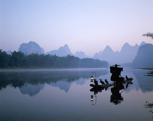 China, Guangxi Province, Guilin / Yangshou, Li River / Cormorant Fisherman / Dawn Eurasia Press