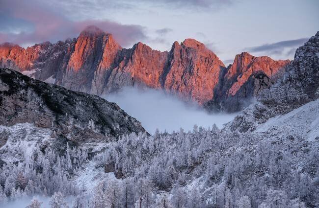 Winter sunset in the mountains Ales Krivec