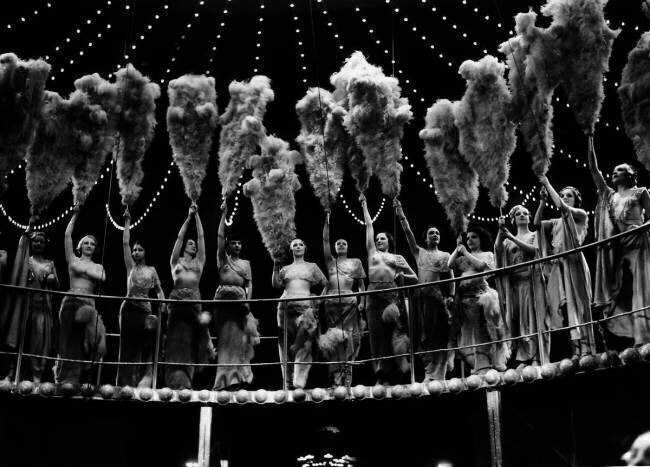 Paris, girls of folies bergères at petits lits blancs ball Keystone