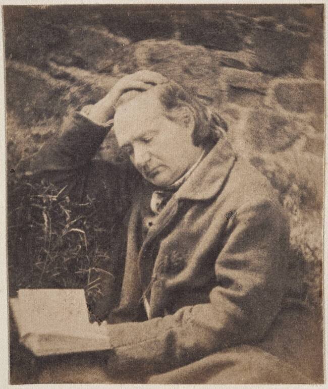 Victor Hugo lisant devant un mur de pierres Auguste Vacquerie