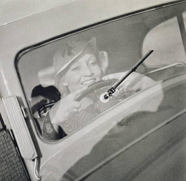 A woman driving, c.1930s anonymous