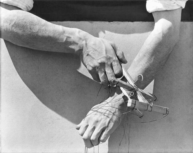 Hands of the puppeteer Tina Modotti