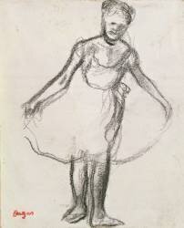 Danseuse debout tenant un tutu (Edgar Degas) - Muzeo.com