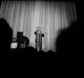 French Singer Jacques Brel on the stage at the Olympia in Paris (anonymous) - Muzeo.com
