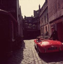 Sports Car Couple (Slim Aarons) - Muzeo.com