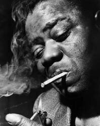 Trumpet Player And Singer Louis Armstrong In London For A Recital Before Resting In His Long Island Estate (Keystone) - Muzeo.com