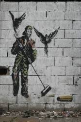 Graffiti d'homme balayant des balles (anonyme) - Muzeo.com