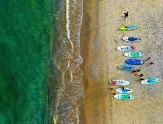 Early morning beach activities. (Arnon Orbach) - Muzeo.com