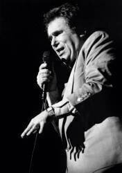 Singer Claude Nougaro on Stage at Olympia January 29, 1992 (b/w photo) (Rue des Archives) - Muzeo.com