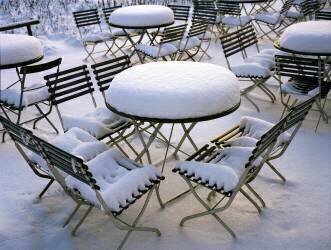 Snowcovered chairs and tables in a cafe, Munich (anonymous) - Muzeo.com