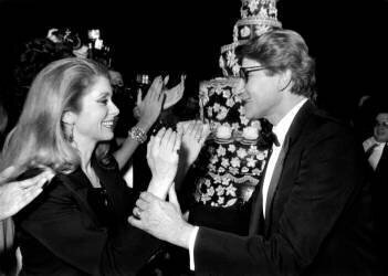 Yves Saint-Laurent Celebrating in Lido in Paris 20 Years of Haute Couture With Catherine Deneuve (Rue des Archives) - Muzeo.com