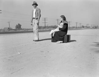 Young family hitchhiking on Highway 99, California (Dorothea Lange) - Muzeo.com