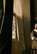 Femme écrivant une lettre et sa servante (détail) (Johannes Vermeer) - Muzeo.com