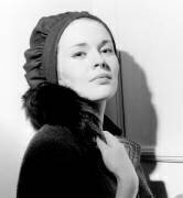 Actress Jean Seberg Trying Hats in Jean Barthet\'S Salon (Rue des Archives) - Muzeo.com
