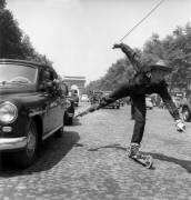 French Skier Henri Oreiller on Champs Elysees in Paris (Rue des Archives) - Muzeo.com
