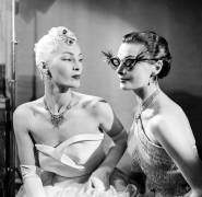 Hairstyle by French hairdresser Antoine and evening glasses by Pierre and Rene, Paris, January 31, 1951 (b/w photo) (Rue des Archives) - Muzeo.com