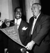 Jazzman Louis Armstrong Receiving A Prize (