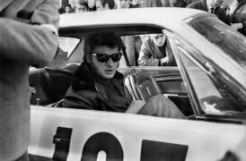 Johnny Hallyday Driving A Ford Mustang (Rue des Archives) - Muzeo.com