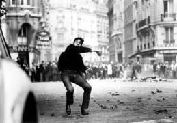 Student Throwing Cobblestones during Demonstration in Paris 1968 (anonymous) - Muzeo.com