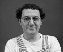 Coluche lors du « Show Coluche » le 4 octobre 1974 (Rue des Archives) - Muzeo.com