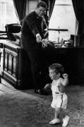 John Fitzgerald Kennedy with his son at the white house in 1961 (anonymous) - Muzeo.com