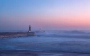 Lighthouse in Porto, Portugal. (Adrian Nunez) - Muzeo.com