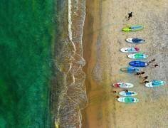 Early morning beach activities. (Arnon Orbach) - Muzeo.com