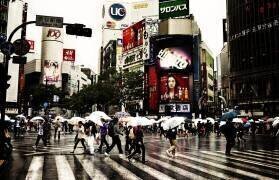 Pedestrians Crossing Busy Intersection in Rain, Tokyo, Japan (anonymous) - Muzeo.com