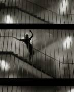 Sensuous Woman Standing on Staircase (Oscar Falk) - Muzeo.com