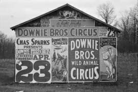 Posters covering a building near Lynchburg to advertise a Downie Bros. circus (Walker Evans) - Muzeo.com