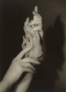 Hand study with figurine (Arnold Genthe) - Muzeo.com