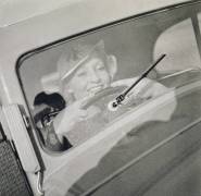 A woman driving, c.1930s (anonymous) - Muzeo.com