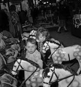 Children looking at toys, Paris, December 14, 1949 (Christmas) (Rue des Archives) - Muzeo.com