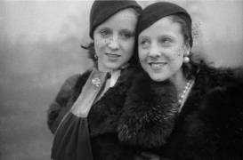 Portrait of Two Young Woman in Fur Coats Smiling (George Mann) - Muzeo.com